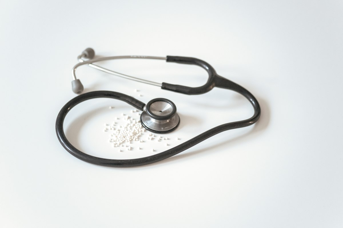 A stethoscope resting on a clinical surface